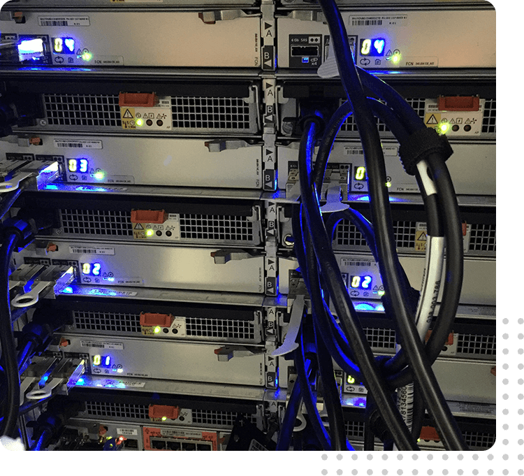 A bunch of servers are stacked up in the rack.
